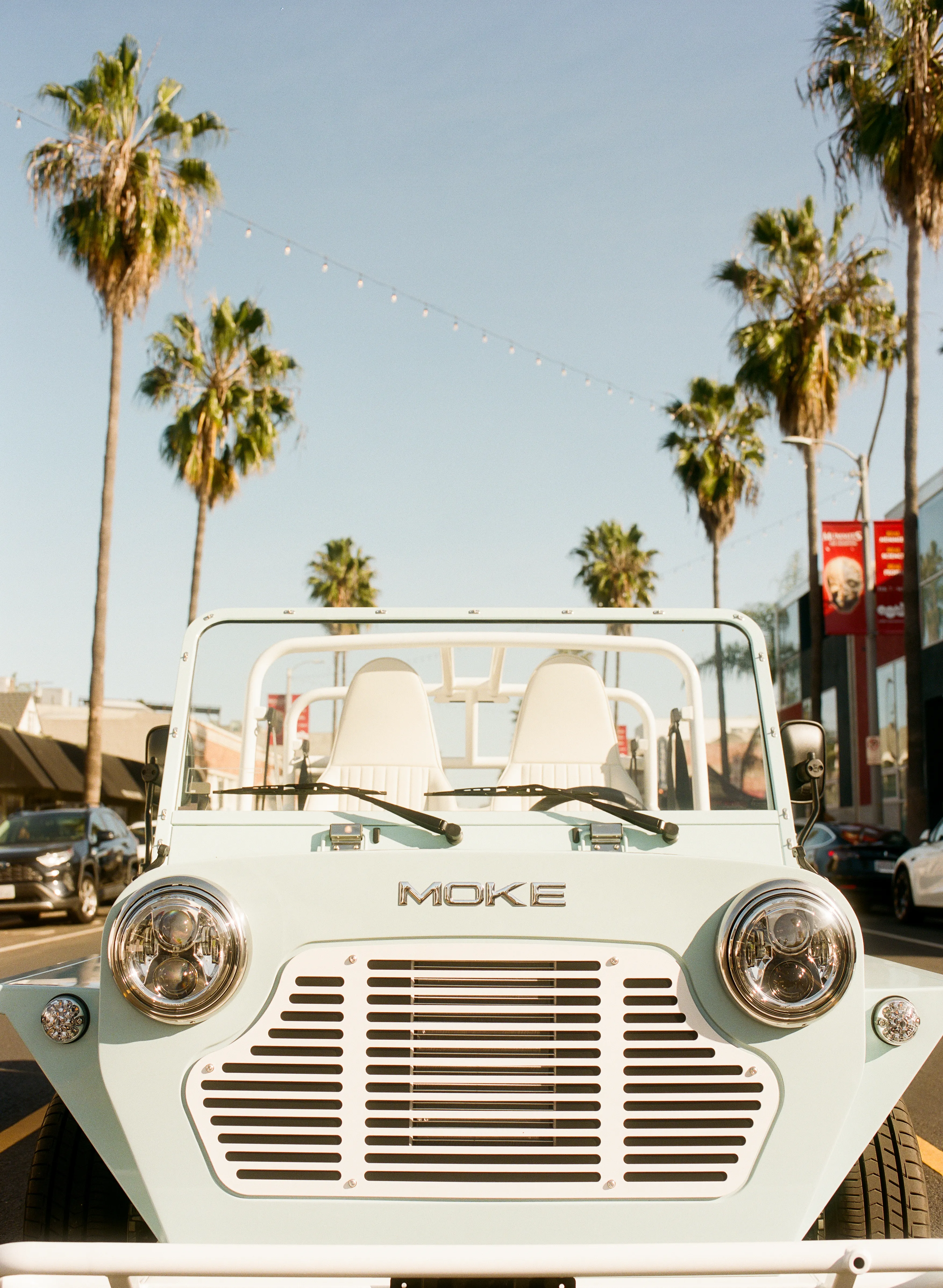 Moke parked at a beachfront destination
