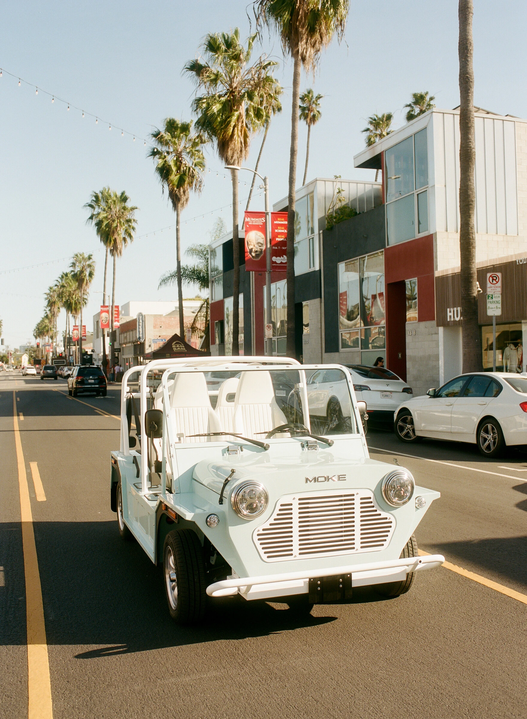 Moke parked on a sunlit California street