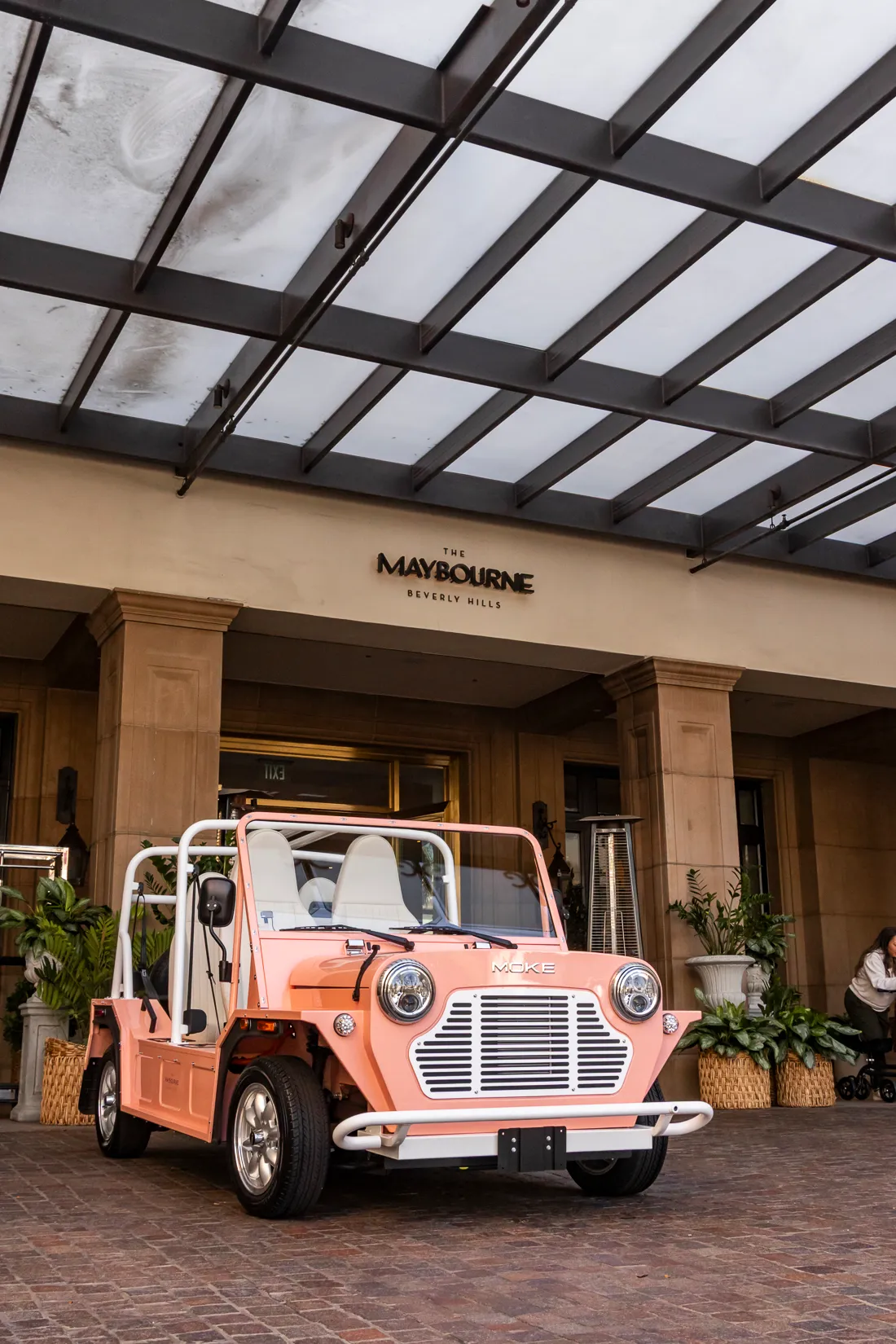 Maybel waiting at the entrance of The Maybourne Beverly Hills