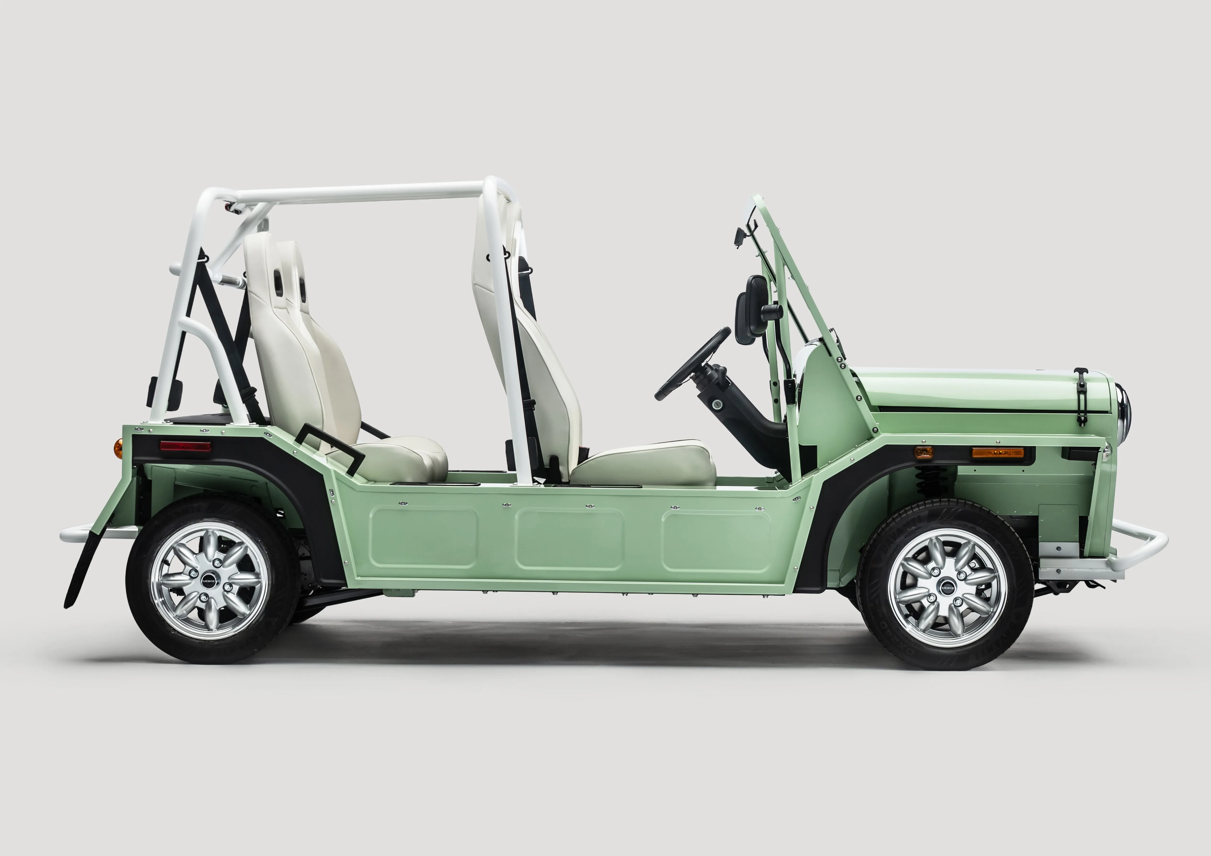 2024 Moke International — Light Green, side profile