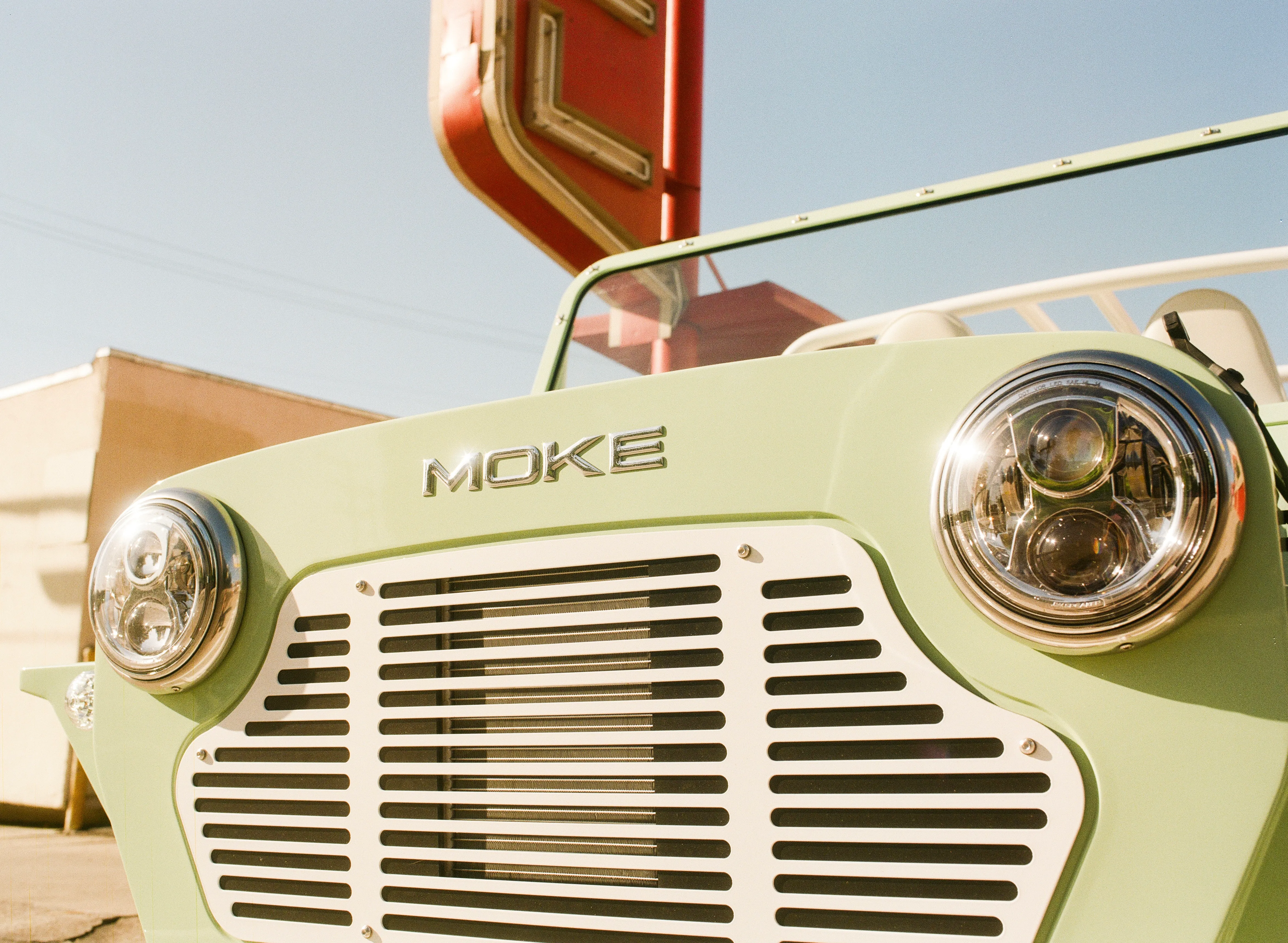 Close-up of the iconic Moke front grille and badge